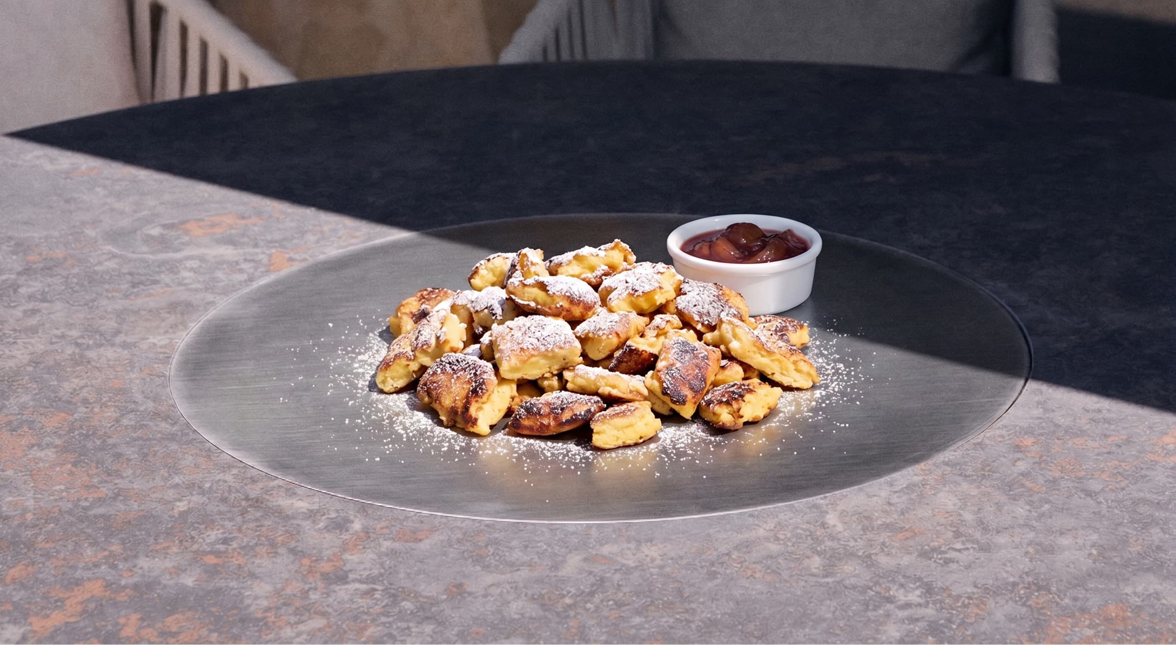Kaiserschmarrn with warm plum compote on the Q-Olento teppanyaki plate